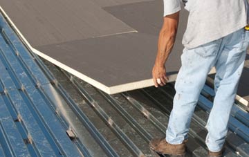 benefits of insulating Court Barton flat roofing